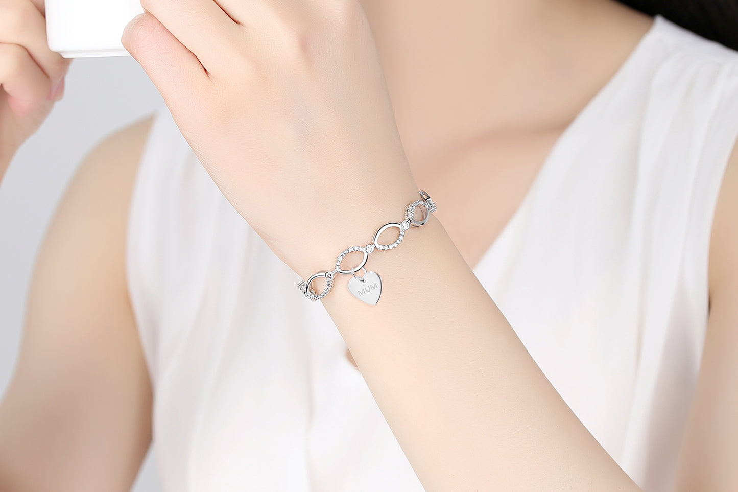 Timeless Bond: Elegant Infinity Bracelet Set for Mum and Dad