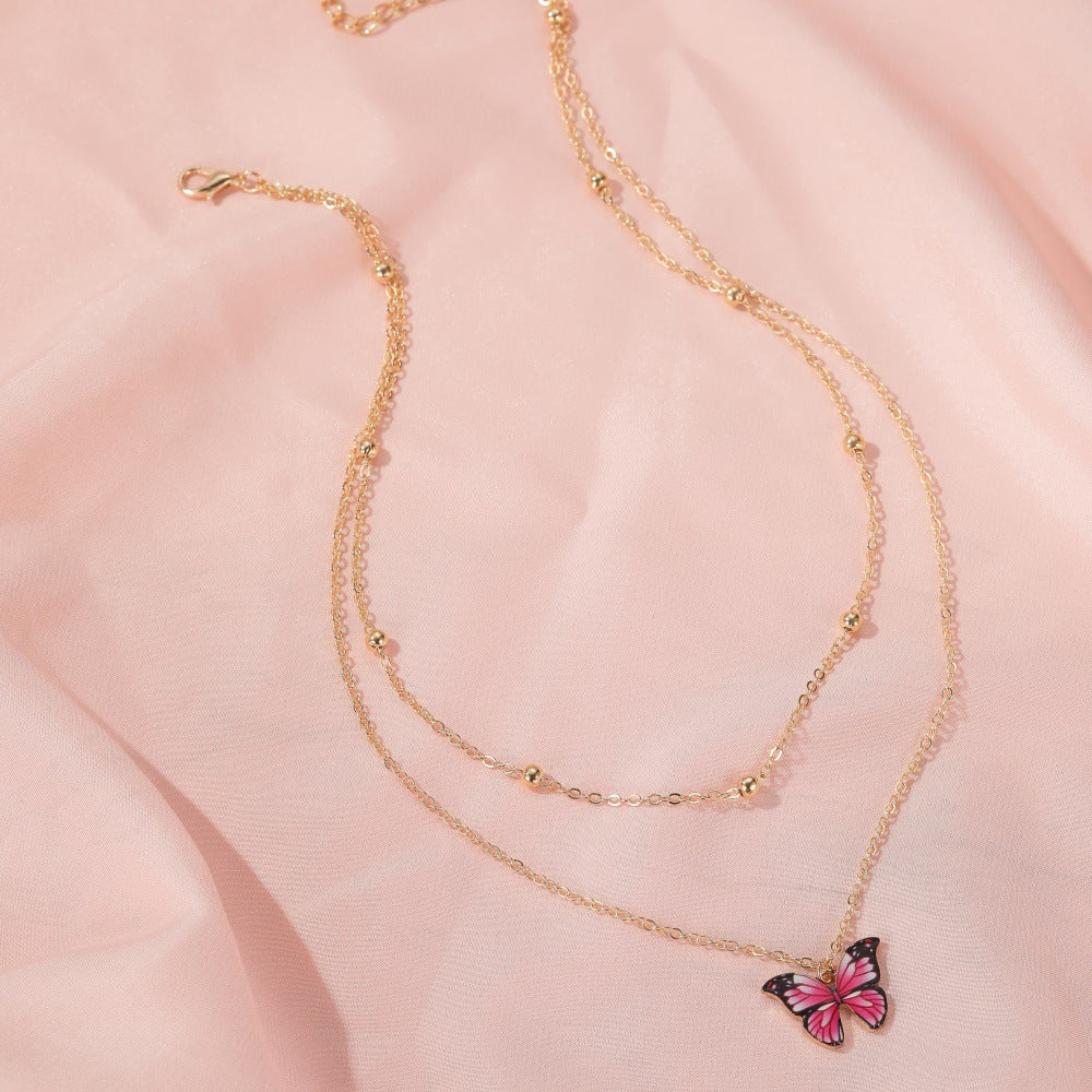Butterfly Gold Tone Layered Pendant Necklace