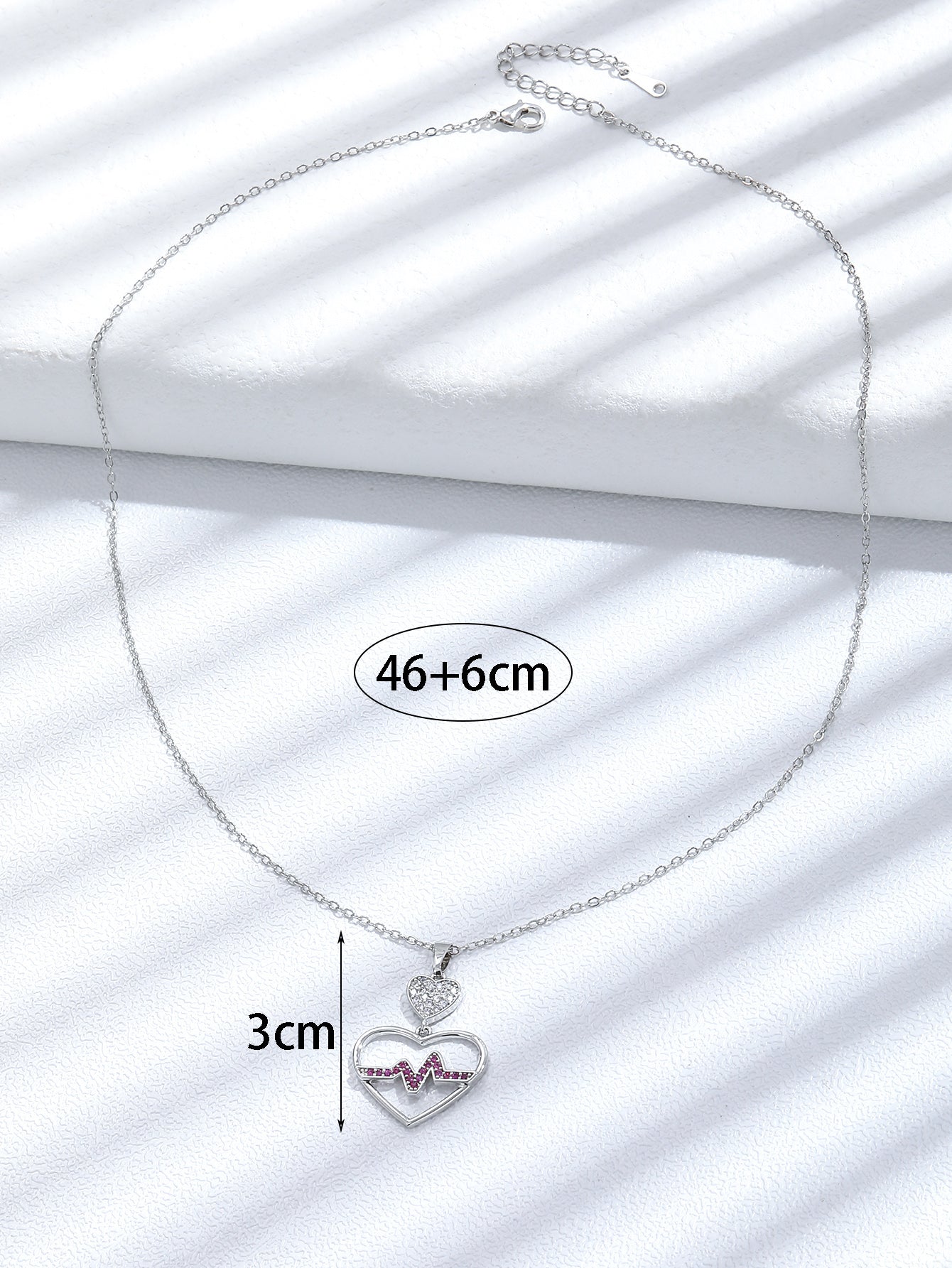 Crystal Filled Heartbeat Pendant