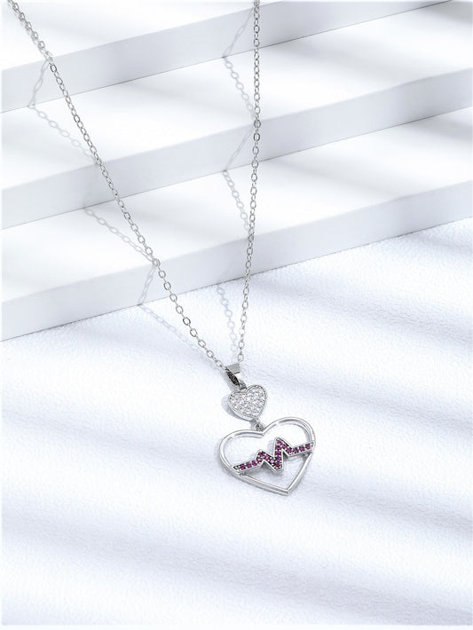 Crystal Filled Heartbeat Pendant