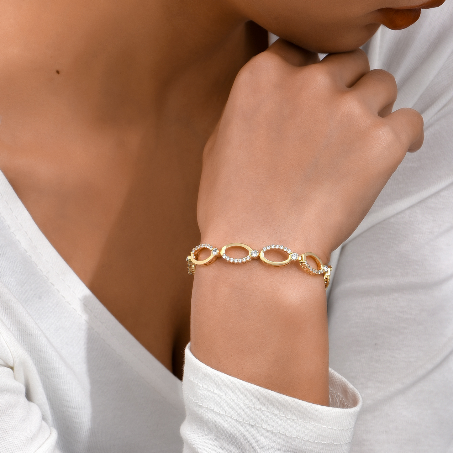 Gold Tone Multi-linked Infinity Bracelet with Premium Crystal