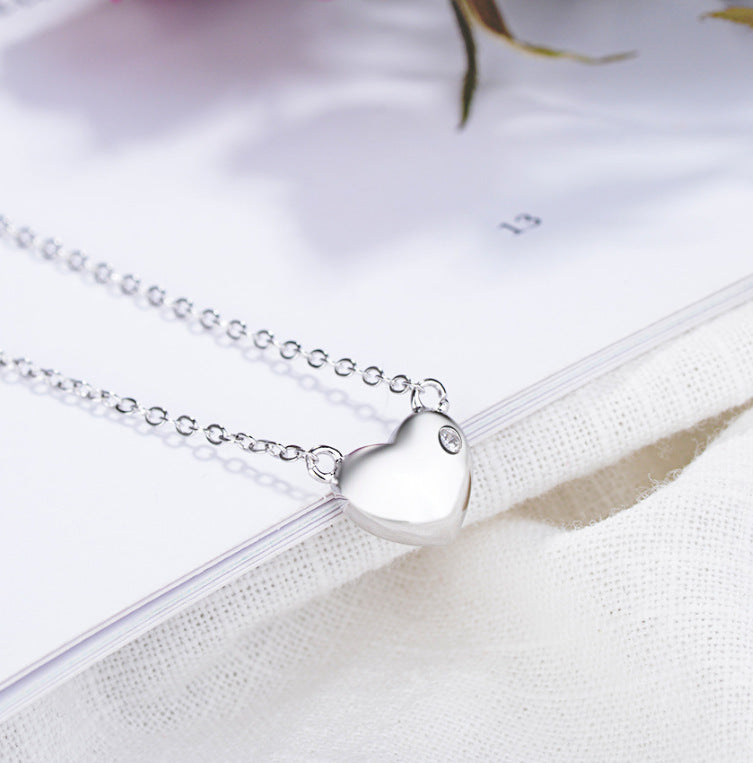 A Moissanite On The Heart Shape Silver Pendant Necklace