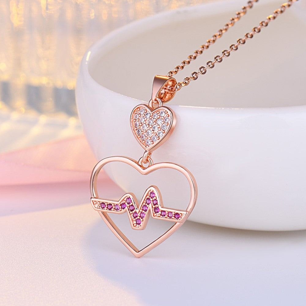 Crystal Filled Heartbeat Pendant