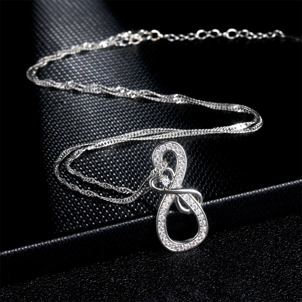 Silver Tone Figure 8 Knot love Crystal Necklace