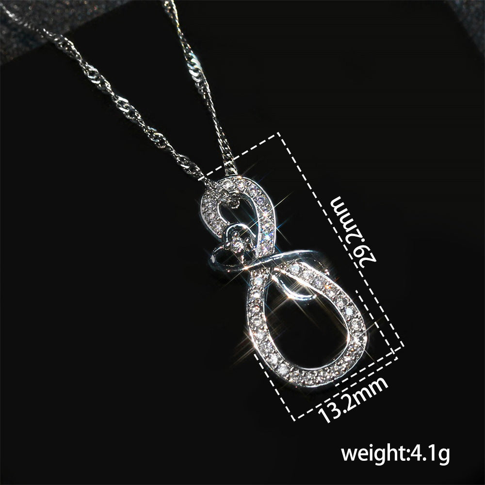 Silver Tone Figure 8 Knot love Crystal Necklace