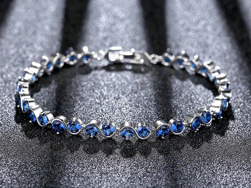 Rhodium Plated Link Bracelet with Royal Blue Cubic Zirconia