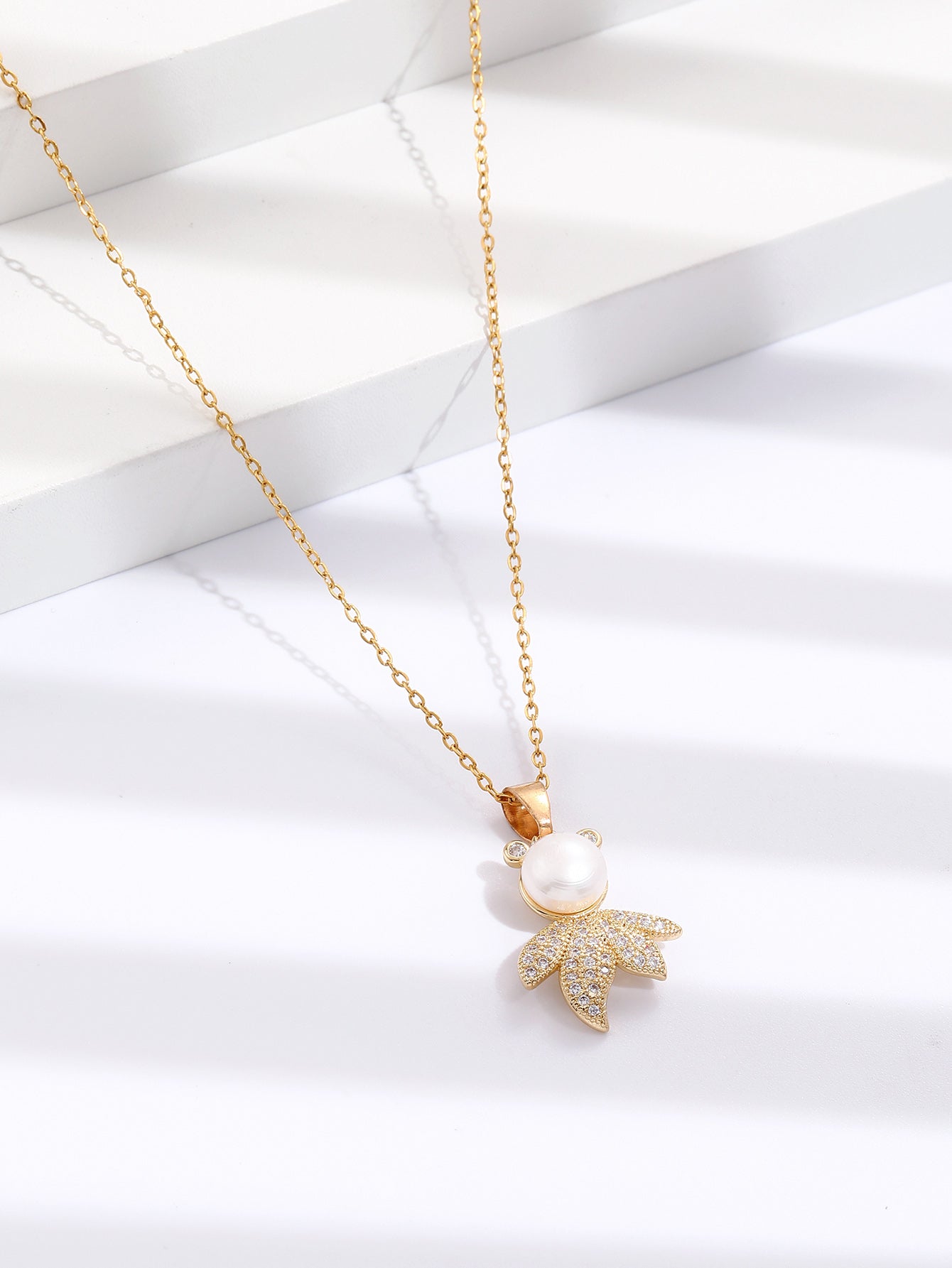 Cute Leaf Man with Pearl Zircon Crystals Gold Tone Pendant Necklace