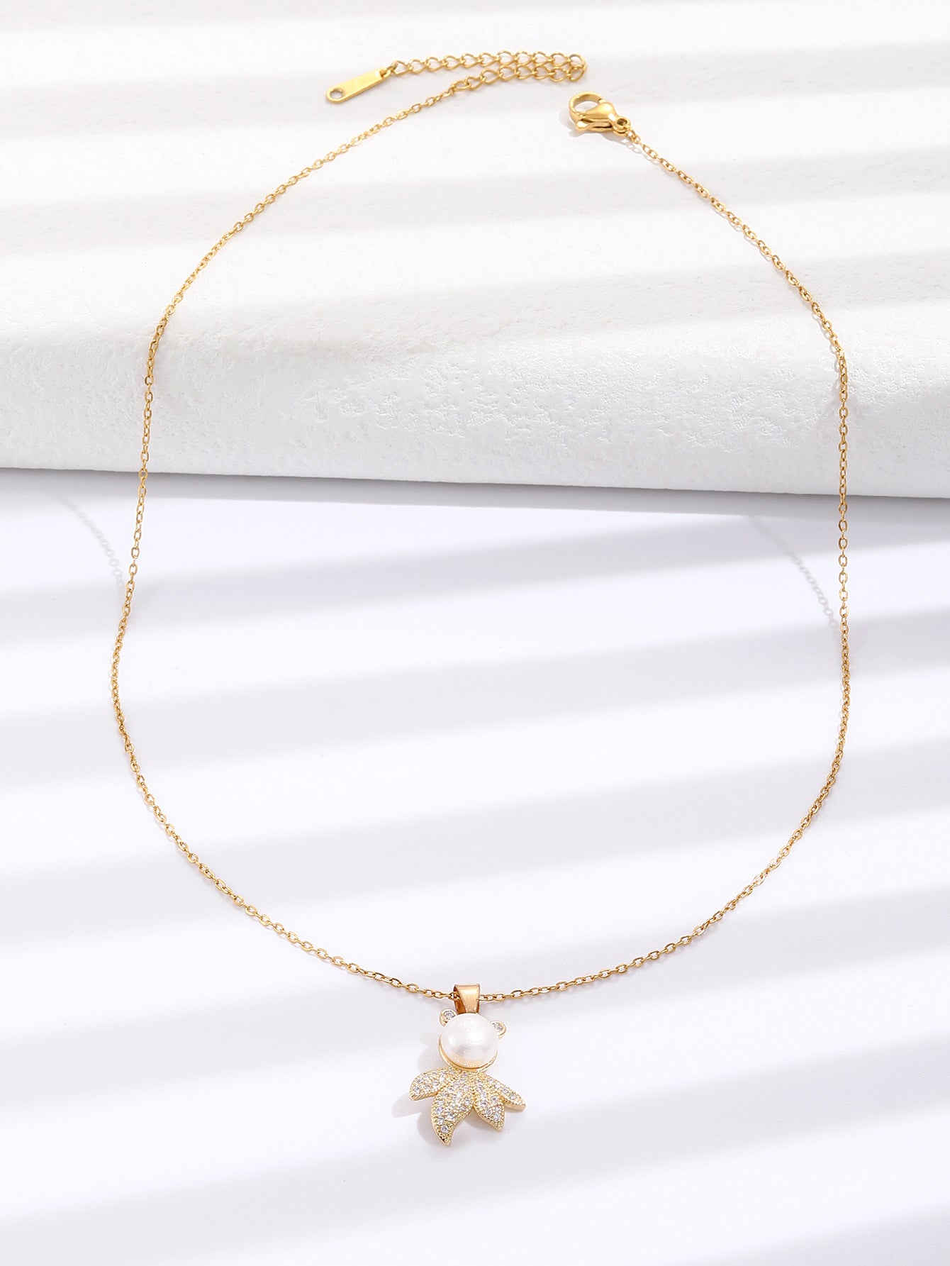 Cute Leaf Man with Pearl Zircon Crystals Gold Tone Pendant Necklace