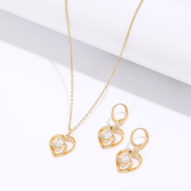 Gold Tone Crystal Heart Windmill Earrings and Necklace Set