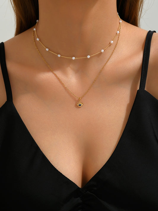 Beautiful Blue Eye and Pearl Necklaces Set in Gold Tone