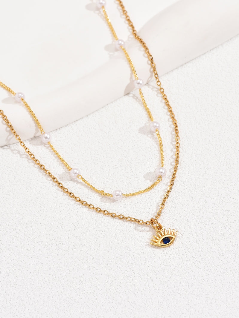 Beautiful Blue Eye and Pearl Necklaces Set in Gold Tone