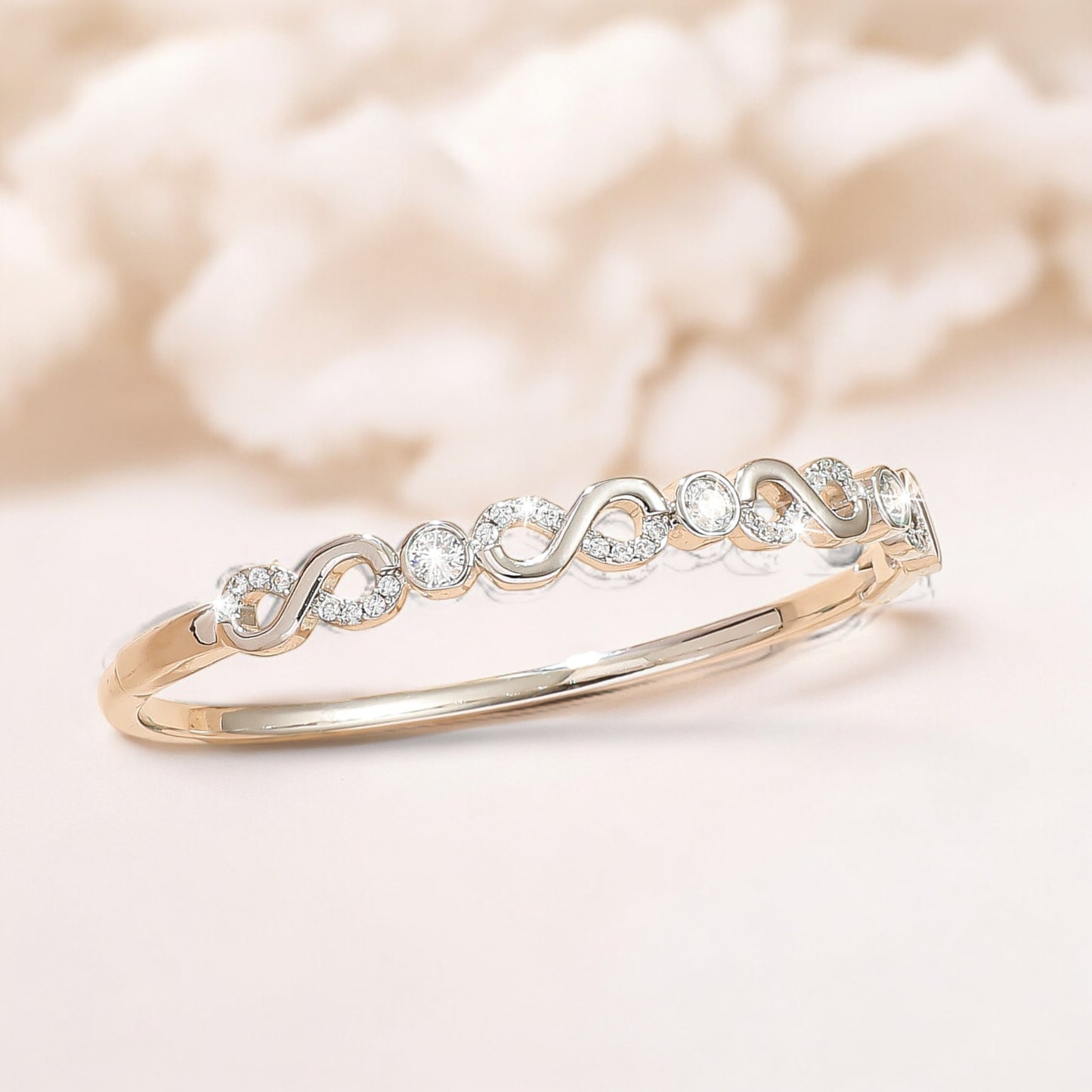 Women Sparkly Infinity Cubic Zirconia Bangle in Silver Tone