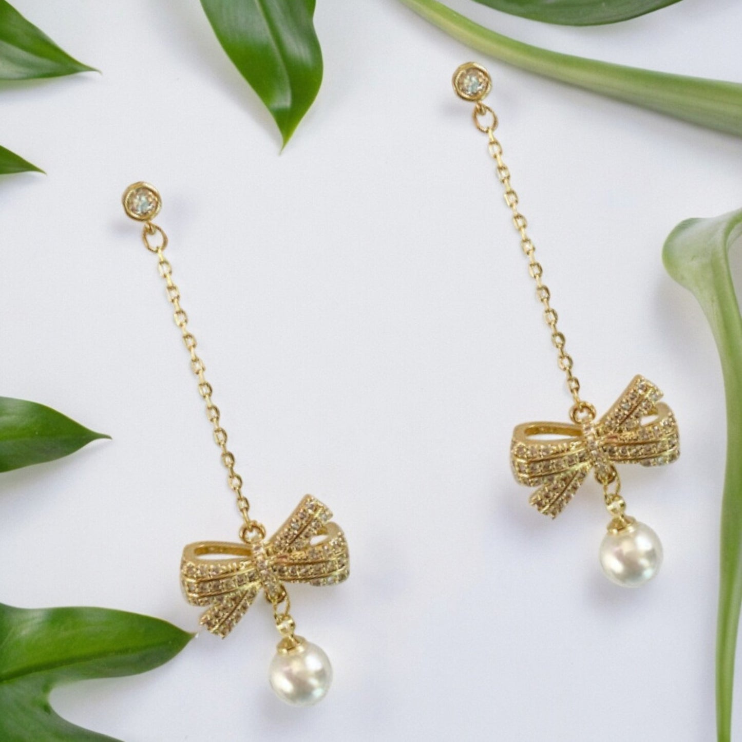 Women Crystal Bow with Pearl Drop Earrings in Gold Tone