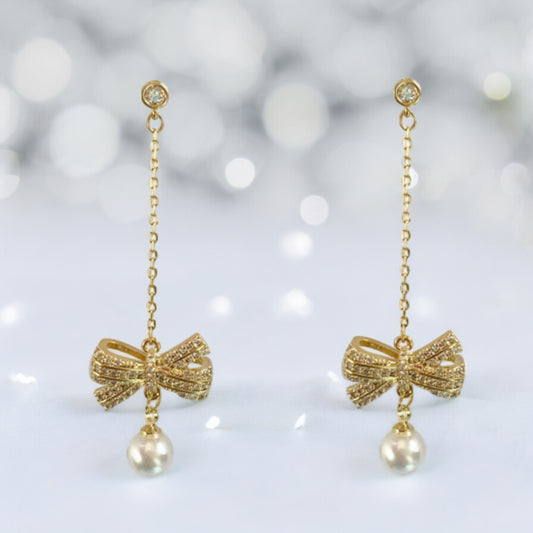 Women Crystal Bow with Pearl Drop Earrings in Gold Tone