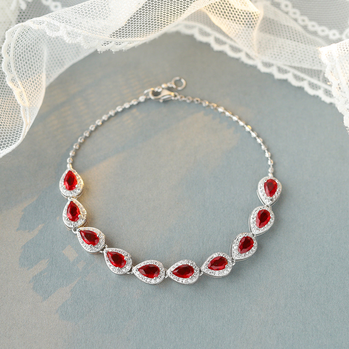 Sterling Silver Ruby Teardrop Tennis Bracelet with Cubic Zirconia