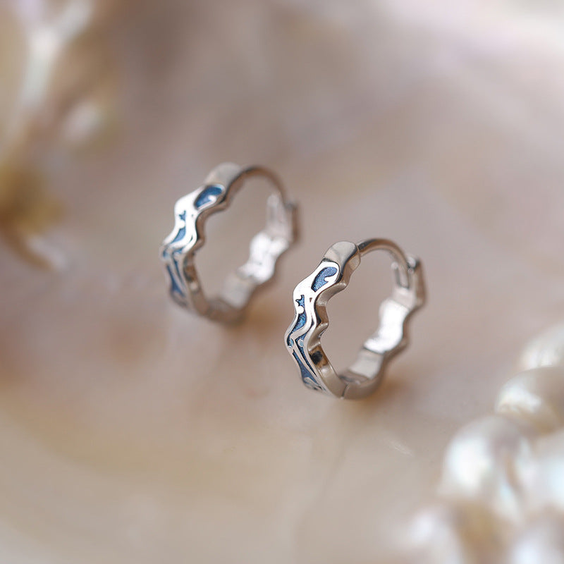 Sterling Silver Wave Hoop Earrings with Cubic Zirconia
