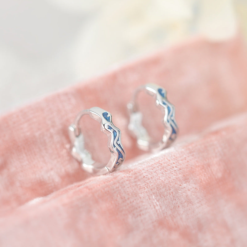 Sterling Silver Wave Hoop Earrings with Cubic Zirconia