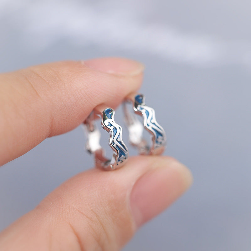 Sterling Silver Wave Hoop Earrings with Cubic Zirconia