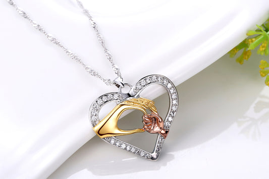 Caring Hands Two Tone Crystal Heart Pendant