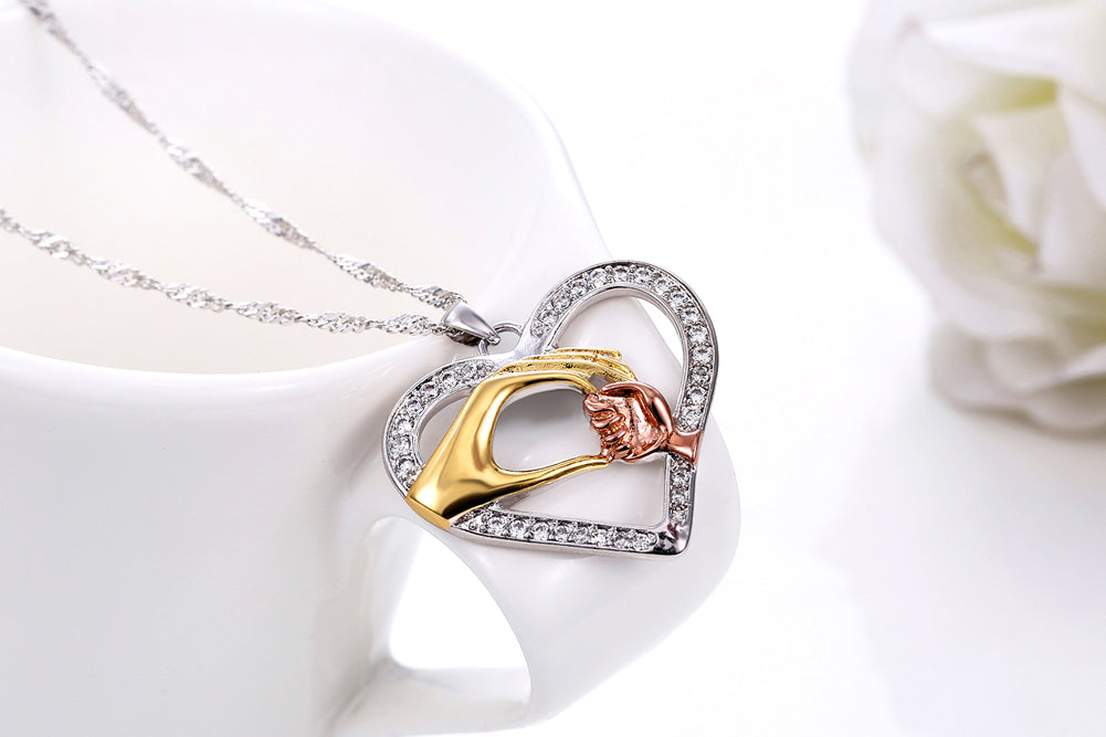 Caring Hands Two Tone Crystal Heart Pendant