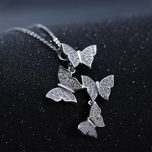 Beautiful Linked Crystal-filled Butterflies Pendant Necklace