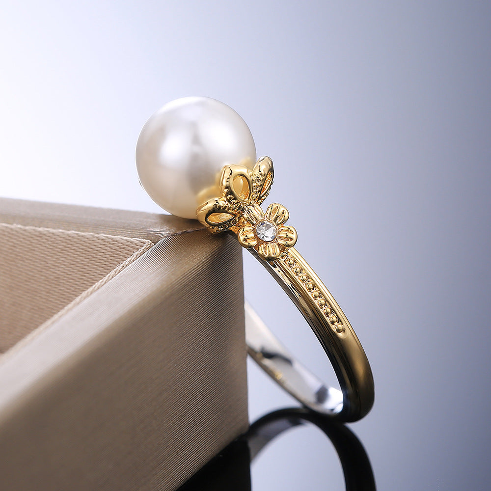 Golden Ring with White Pearl