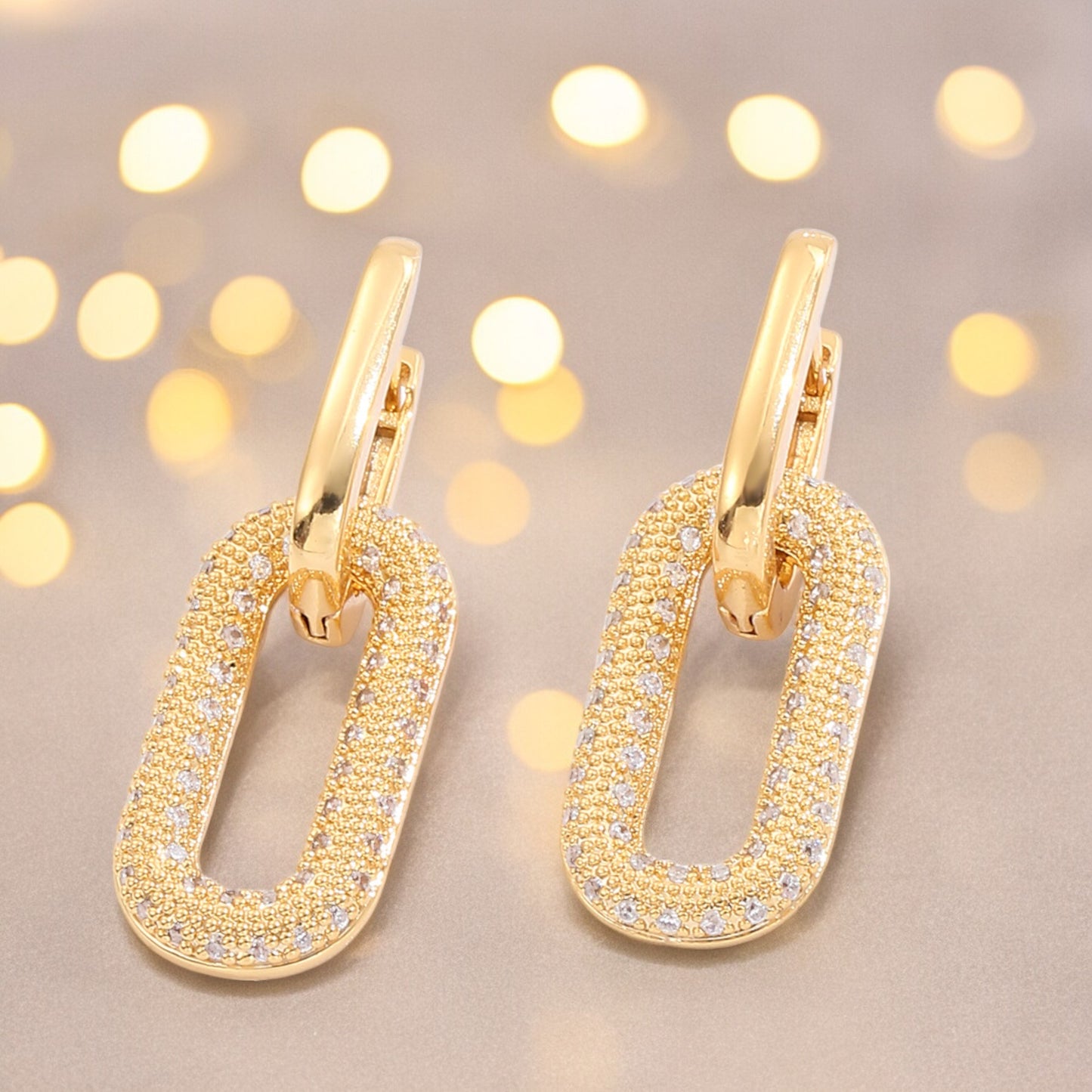 Sparkly Crystal Interlocking Chain Hoop Drop Earrings in Gold Tone