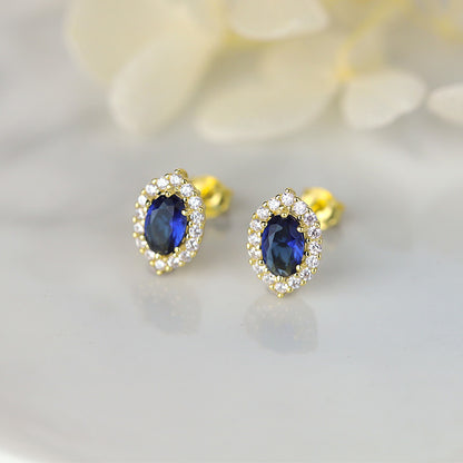 Sterling Silver Regal Blue C/Z 14K Yellow Gold Plated Stud Earrings