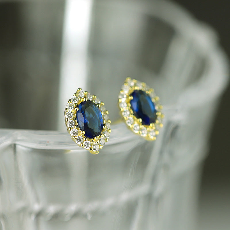 Sterling Silver Regal Blue C/Z 14K Yellow Gold Plated Stud Earrings