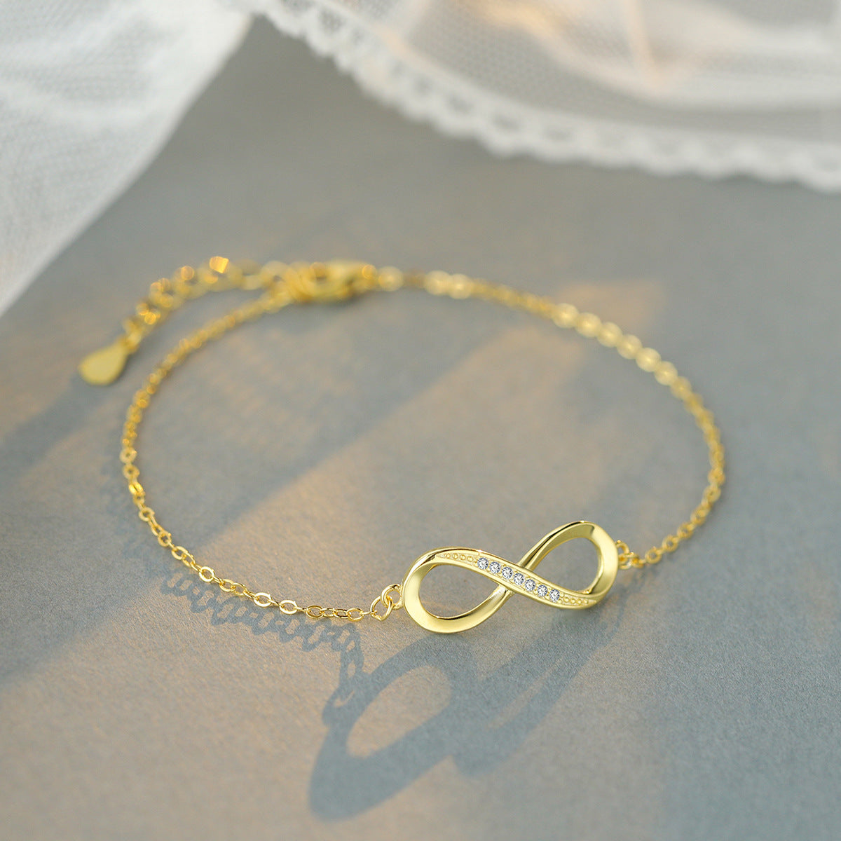 Sterling Silver Infinity 14K Yellow Gold Plated C/Z Bracelet