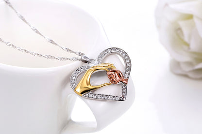 Caring Hands Two Tone Crystal Heart Pendant